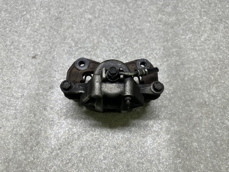 Суппорт тормозной передний левый HYUNDAI ACCENT MC 06-10