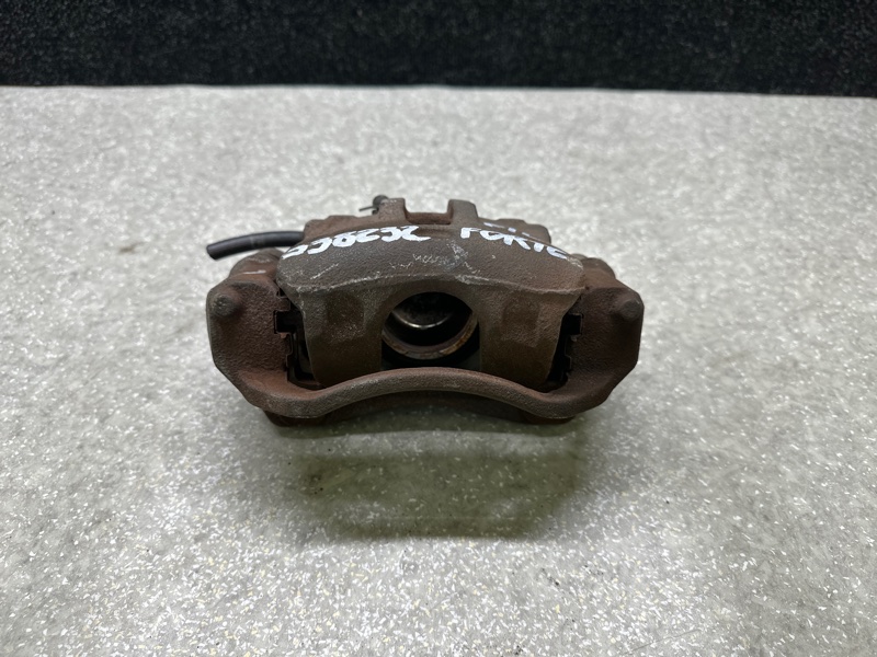 Суппорт тормозной передний левый FORTE/CERATO TD 08-13