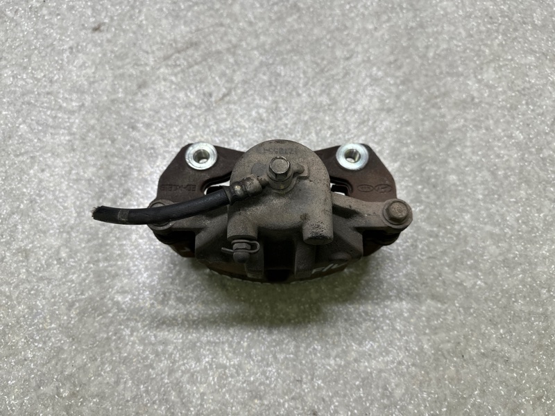 Суппорт тормозной передний левый KIA FORTE/CERATO TD 08-13