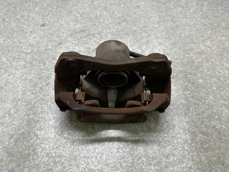 Суппорт тормозной передний левый FORTE/CERATO TD 08-13