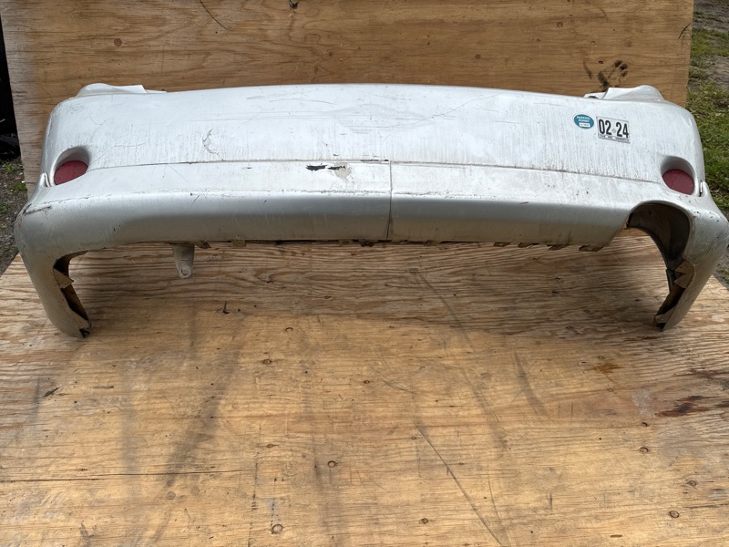 Бампер задний COROLLA 150 06-13