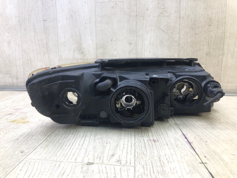 Фара левая GRANDEUR 05-11 TG