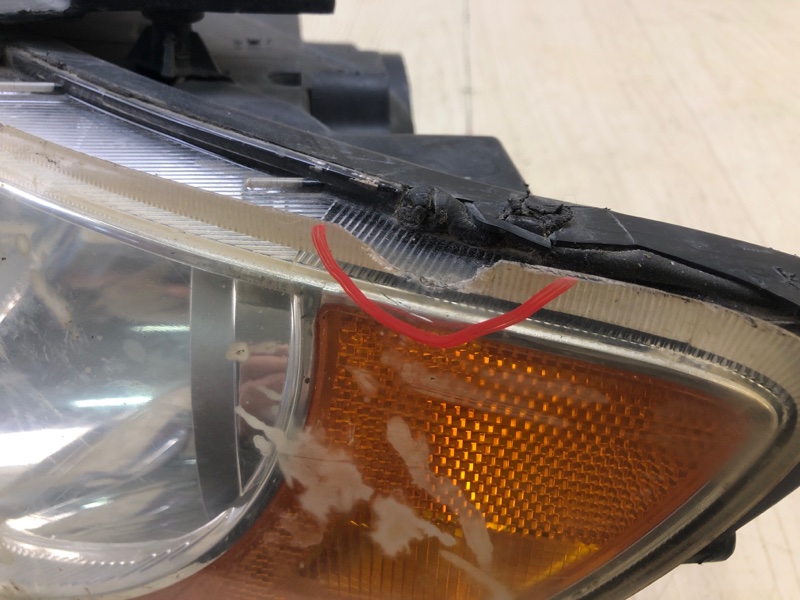 Фара левая GRANDEUR 05-11 TG