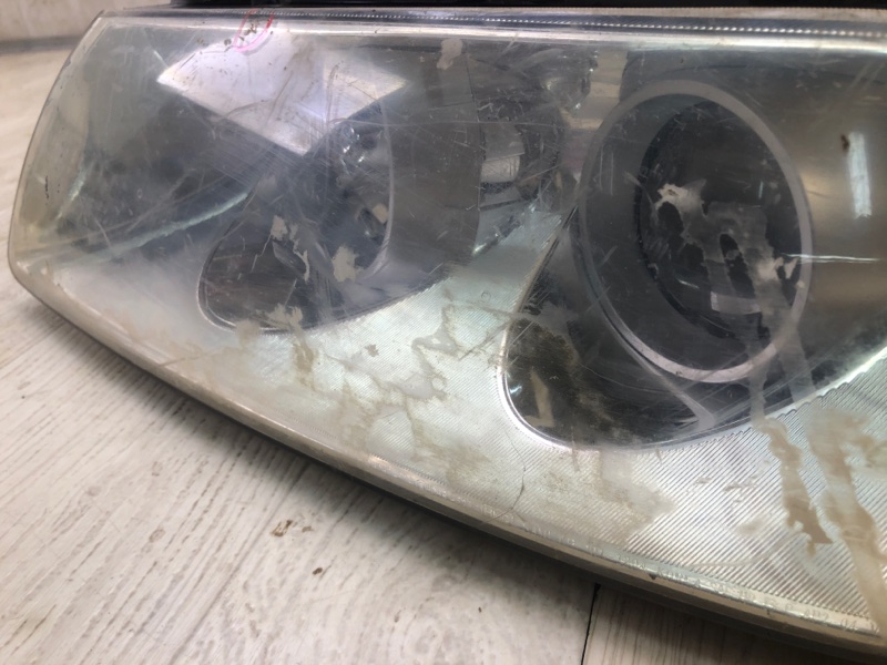 Фара левая GRANDEUR 05-11 TG