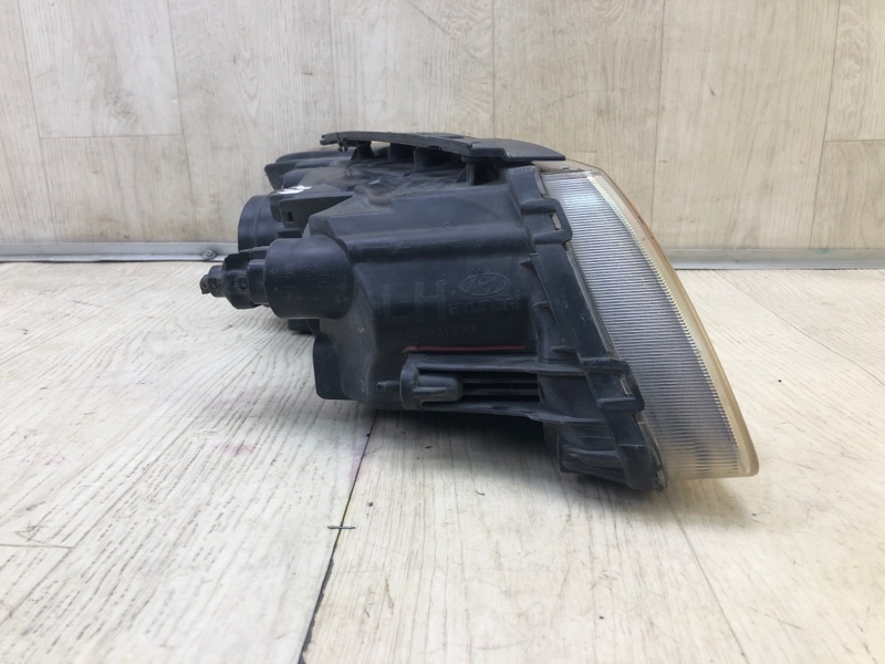 Фара левая HYUNDAI GRANDEUR 05-11 TG