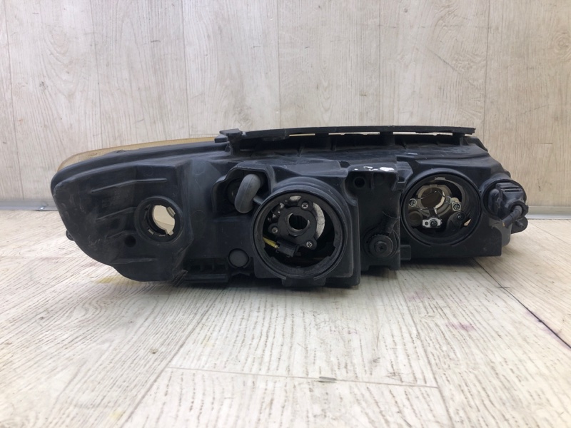 Фара левая GRANDEUR 05-11 TG