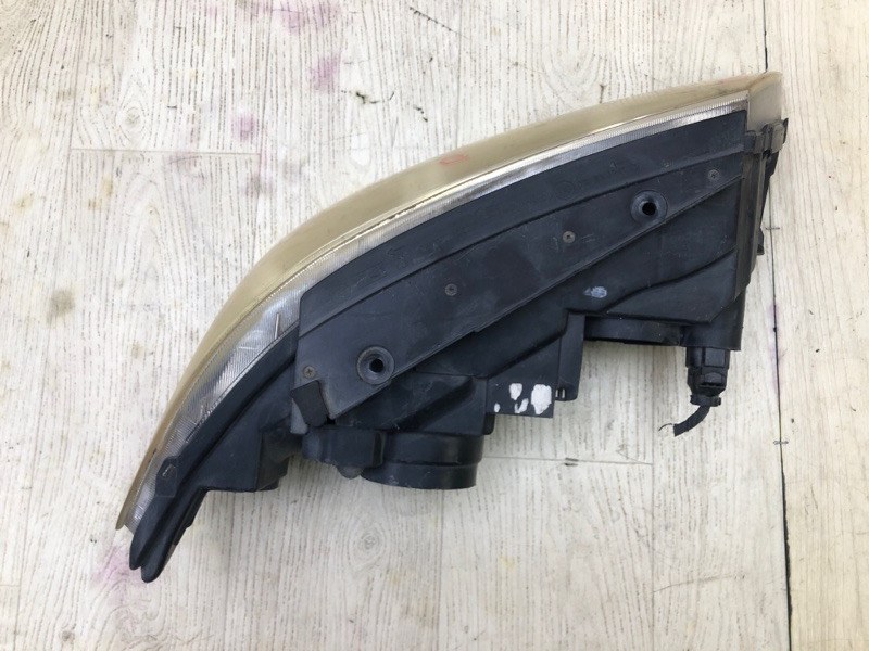 Фара левая GRANDEUR 05-11 TG