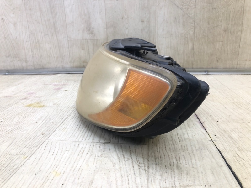 Фара левая GRANDEUR 05-11 TG