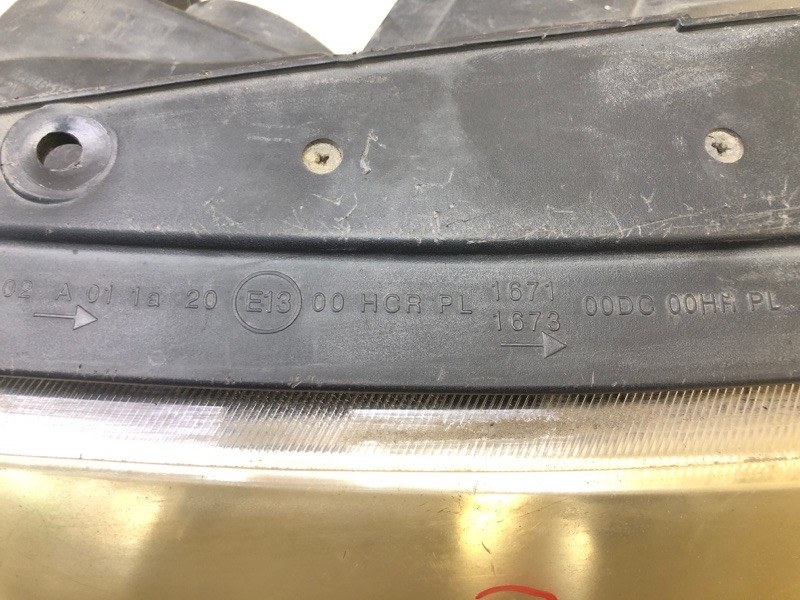 Фара левая GRANDEUR 05-11 TG