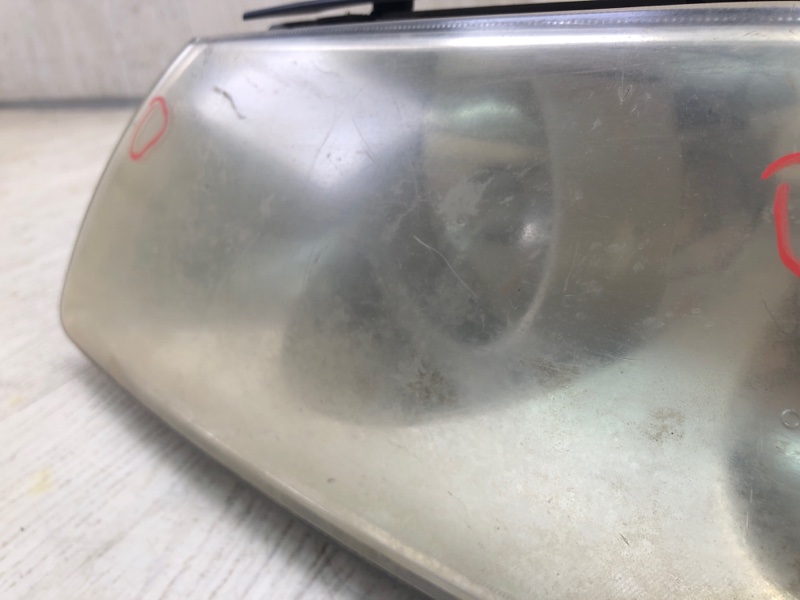 Фара левая GRANDEUR 05-11 TG