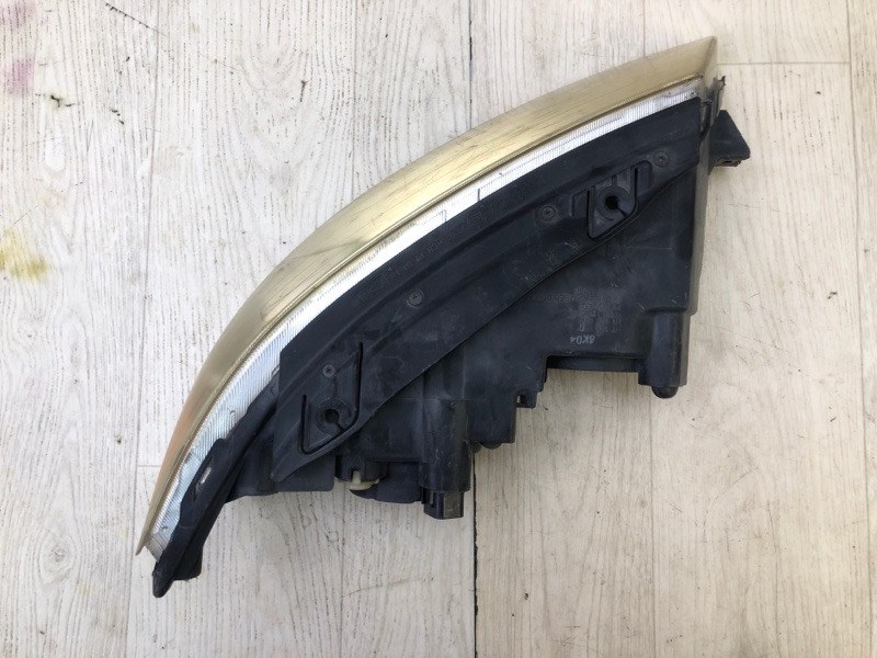 Фара левая SONATA NF 04-10