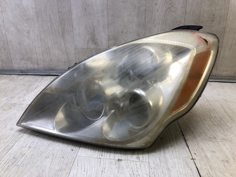 Фара левая ENTOURAGE 06-09