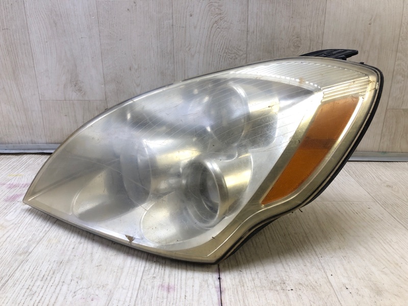 Фара левая ENTOURAGE 06-09