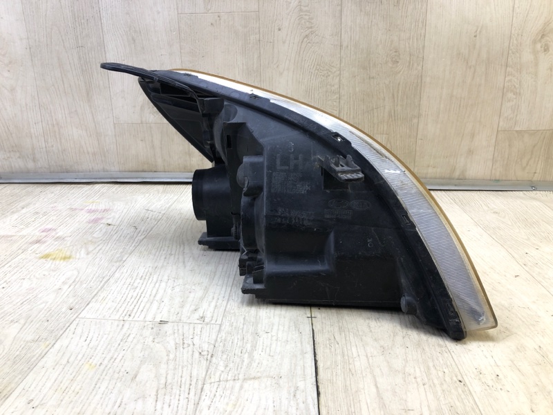 Фара левая HYUNDAI ENTOURAGE 06-09