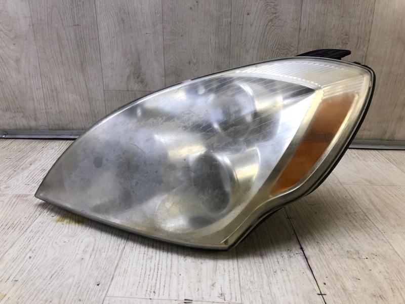 Фара левая ENTOURAGE 06-09