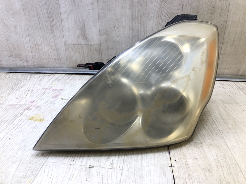 Фара левая HYUNDAI ENTOURAGE 06-09 921014J000 Б/У