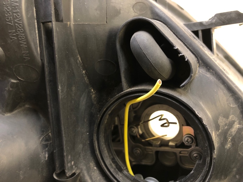 Фара левая ENTOURAGE 06-09