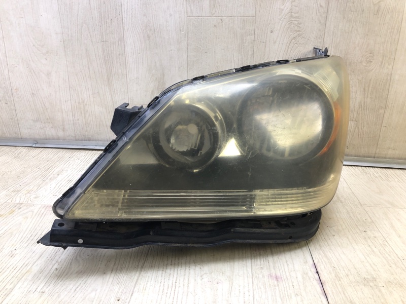 Фара левая ODYSSEY 05-10