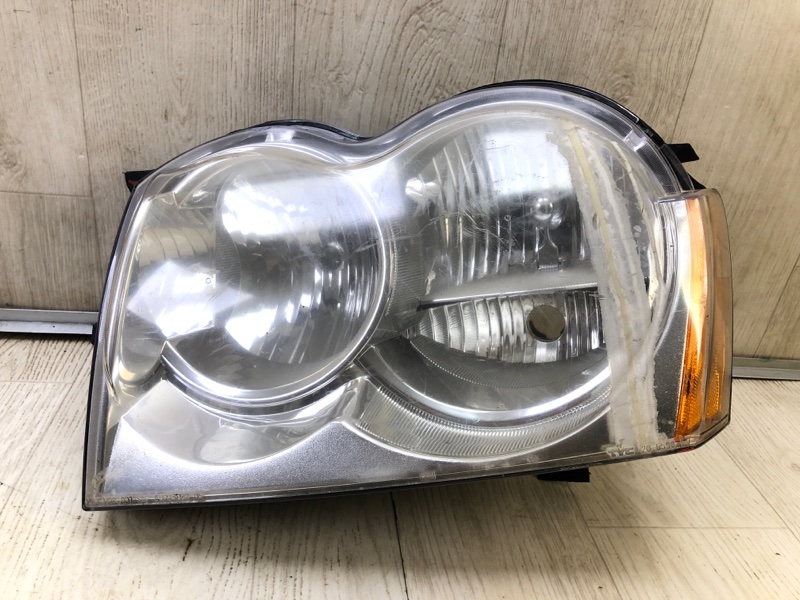 Фара левая JEEP GRAND CHEROKEE 04-10 55156351AF Б/У