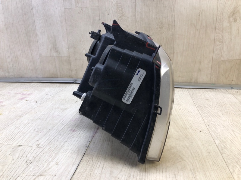 Фара левая GRAND CHEROKEE 04-10