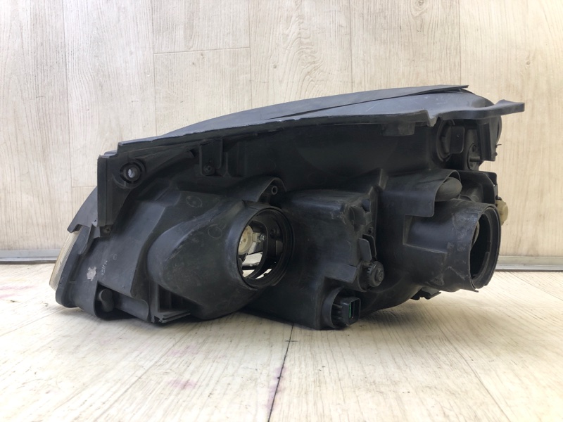 Фара правая CARENS/RONDO 06-12