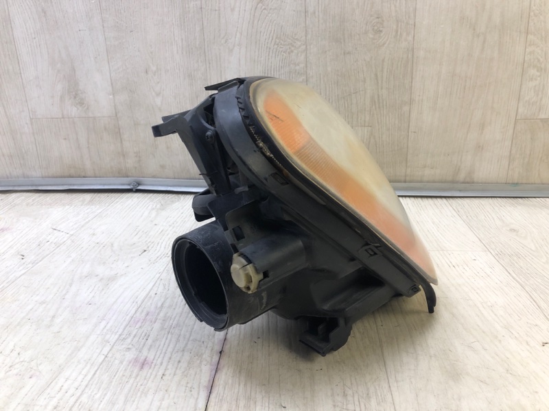 Фара правая CARENS/RONDO 06-12