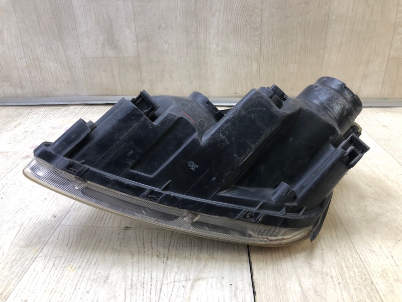 Фара правая CARENS/RONDO 06-12