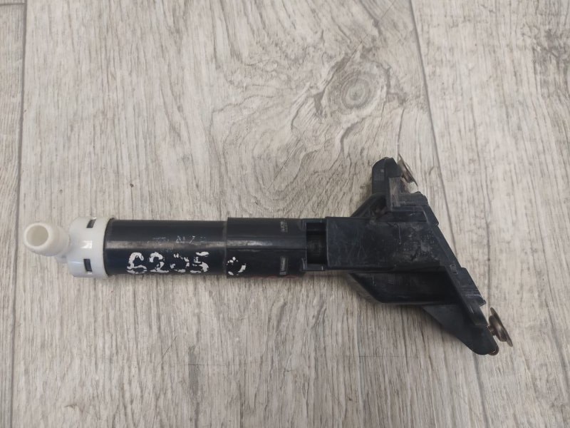 Форсунка омывателя фар правая CIVIC 4D 06-11 FD