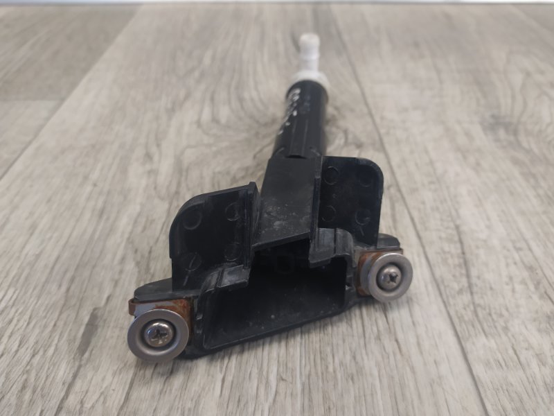 Форсунка омывателя фар правая CIVIC 4D 06-11 FD