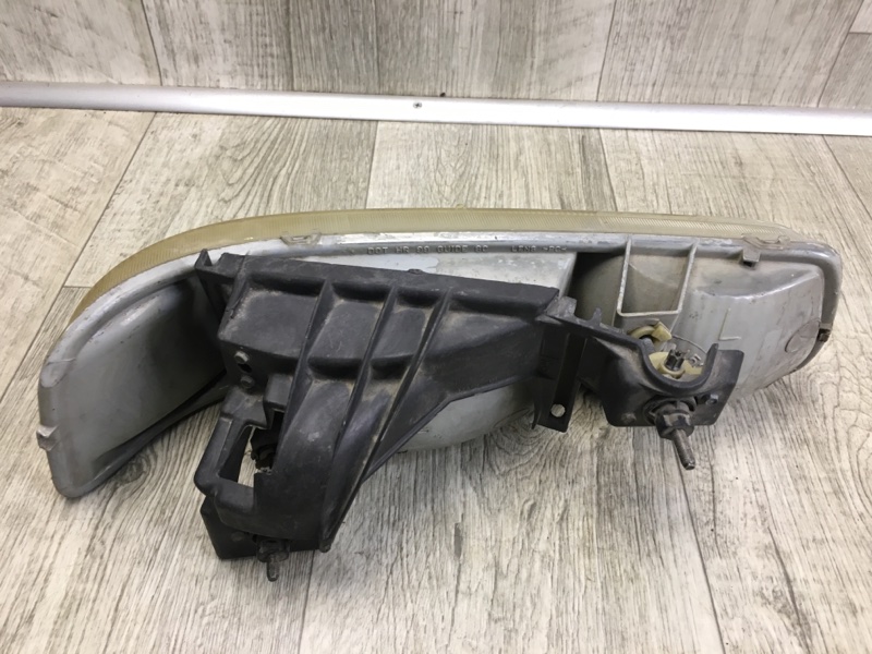 Фара левая SUBURBAN 00-06