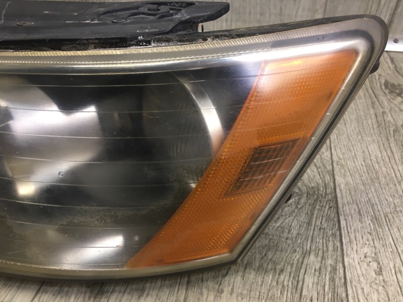 Фара левая SONATA NF 04-10