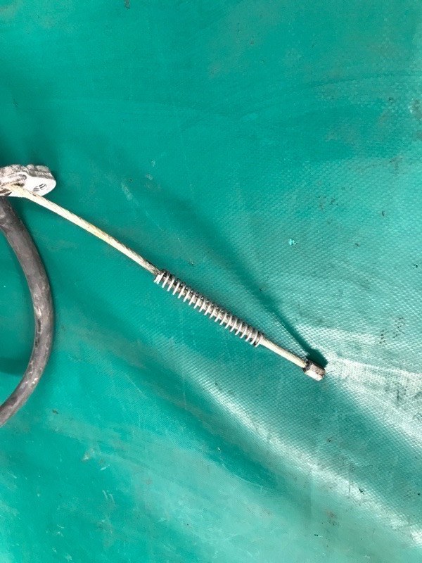 Трос стояночного тормоза левый NISSAN ROGUE 08-15 2.5 QR25DE