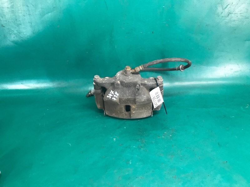 Суппорт тормозной передний левый X-TRAIL/ROGUE T32 13-20 2016 2.5 QR25DE