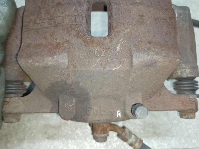 Суппорт тормозной передний правый X-TRAIL/ROGUE T32 13-20 2016 2.5 QR25DE