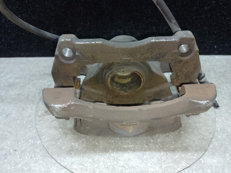 Суппорт тормозной передний левый NISSAN X-TRAIL/ROGUE T32 13-20