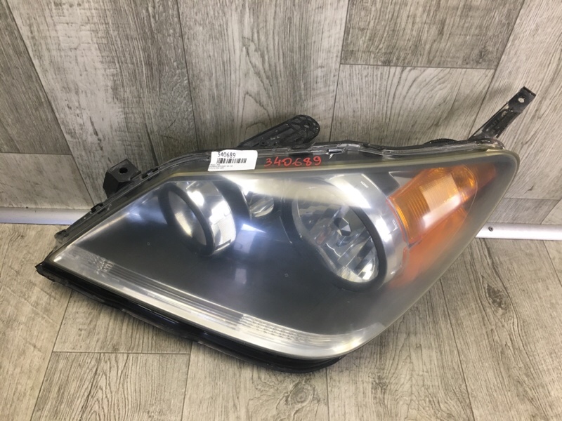 Фара левая ODYSSEY 05-10