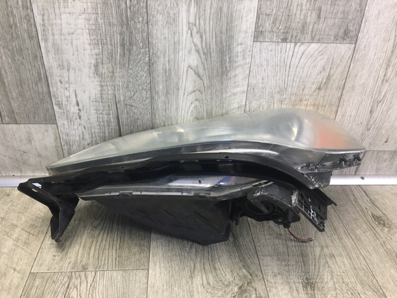 Фара левая ODYSSEY 05-10