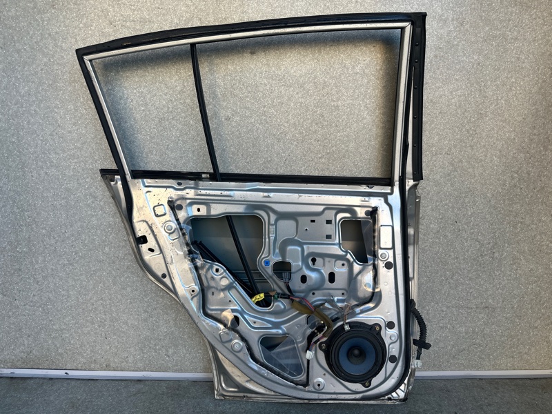 Дверь задняя левая TIIDA/VERSA C11 04-11