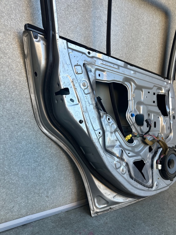 Дверь задняя левая TIIDA/VERSA C11 04-11