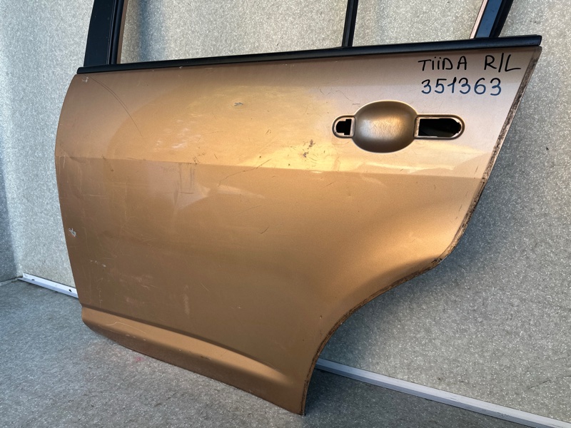 Дверь задняя левая TIIDA/VERSA C11 04-11