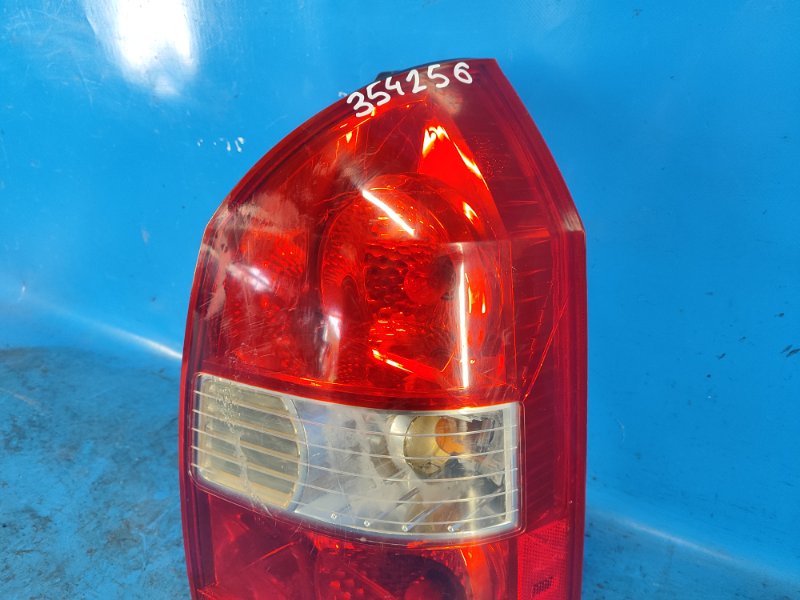 Фонарь наружный правый TUCSON 04-10