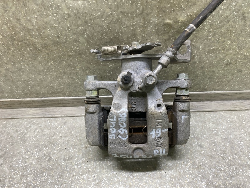 Суппорт тормозной задний левый KIA SOUL SK3 19- 2021 G4FJ 1.6 58210-K0100 Б/У