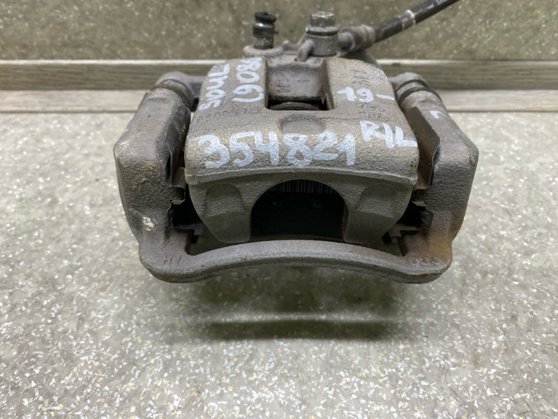 Суппорт тормозной задний левый KIA SOUL SK3 19- G4FJ 1.6