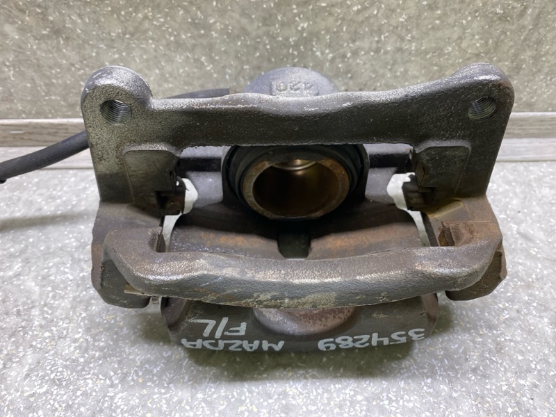 Суппорт тормозной передний левый 6 GJ 12-