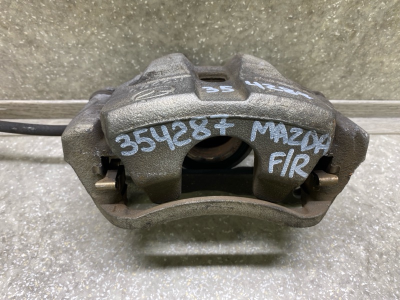 Суппорт тормозной передний правый 6 GJ 12-