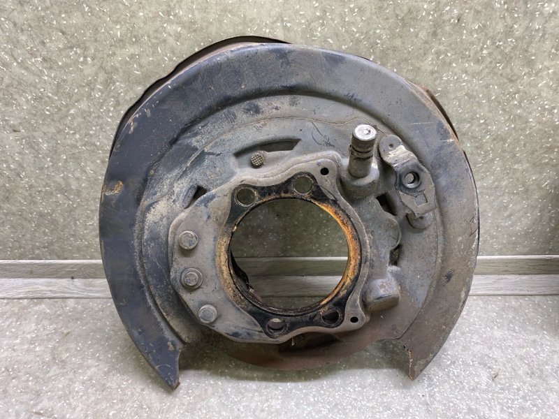 Тормозной механизм левый FORESTER 12-19 2015 2.5 FB25B