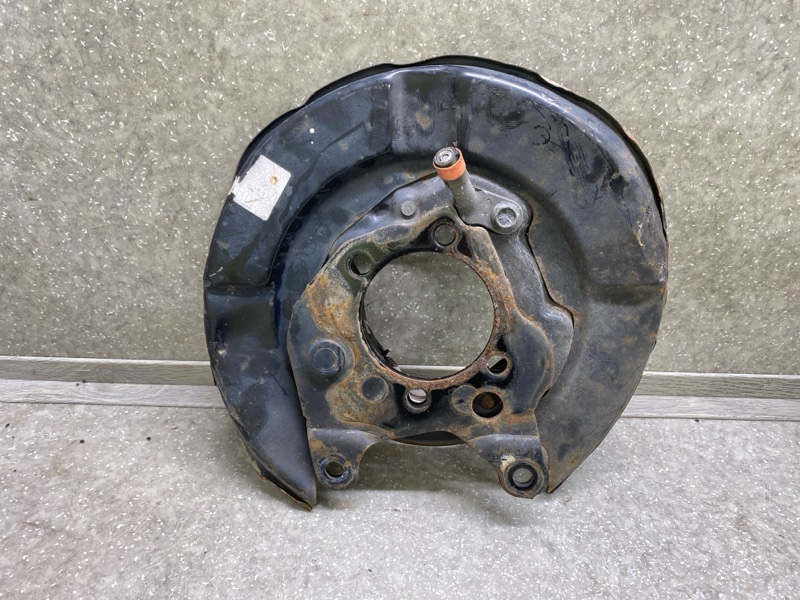 Тормозной механизм левый X-TRAIL/ROGUE T32 13-20 Тормозной механизм левый X-TRAIL/ROGUE T32 13-20