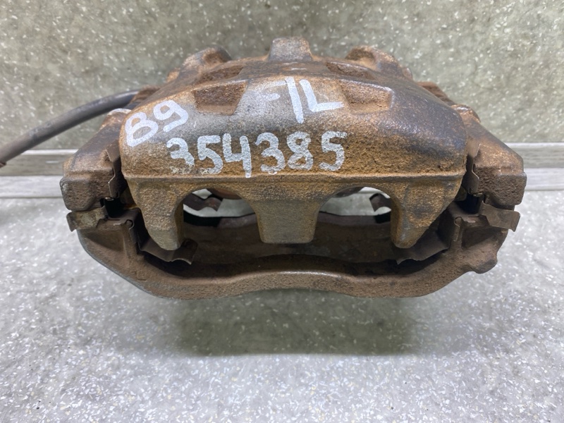 Суппорт тормозной передний левый TRIBECA B9 05-07