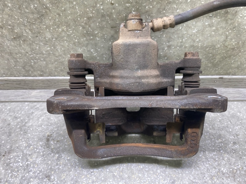 Суппорт тормозной задний левый SUBARU FORESTER SG 02-07 2.5 EJ253