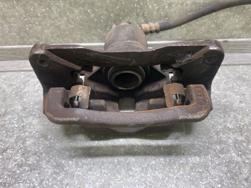 Суппорт тормозной задний левый FORESTER SG 02-07 2005 2.5 EJ253